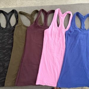 A bundle of Lululemon Nulu T-back Tank Top - Size 4